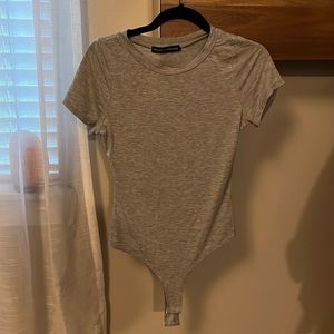 Naked Wardrobe Tee shirt Bodysuit